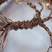 brown wire tree trunk double wrapped with a tick strand of wire